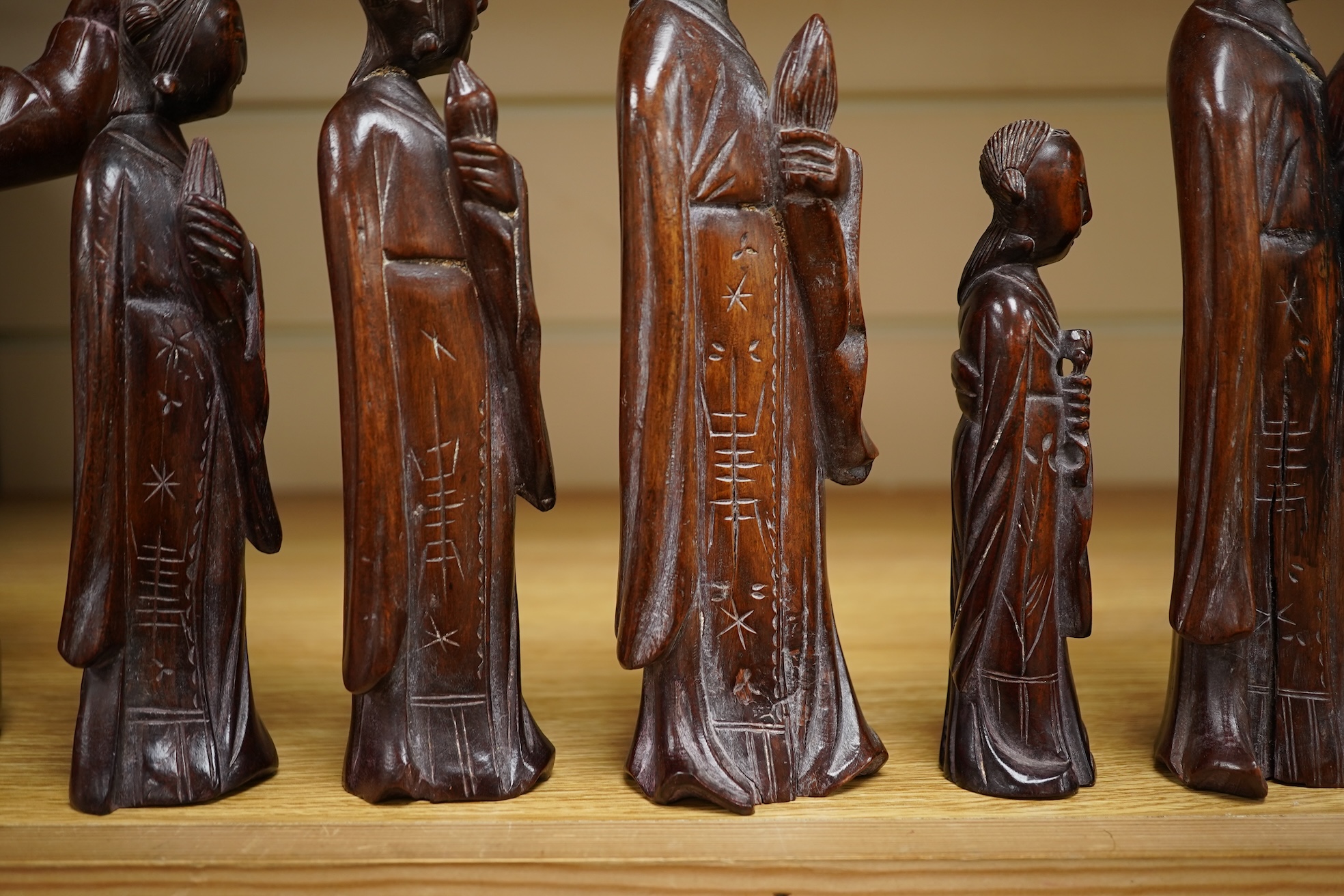 Six mid 20th century Chinese carved wood figures holding lotus and a Cultural Revolution carving of turin girls (7) tallest 21cm